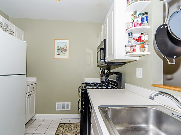 36 Cummings Road, Unit 2 Boston, MA 02135 - Photo 5 of 15 a kitchen with a refrigerator and a sink