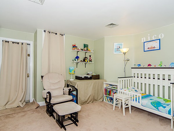 36 Cummings Road, Unit 2 Boston, MA 02135 - Photo 8 of 15 a living room with furniture and a window
