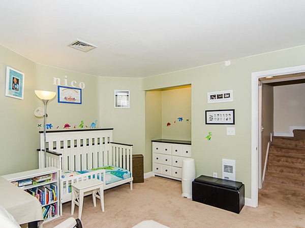 36 Cummings Road, Unit 2 Boston, MA 02135 - Photo 9 of 15 a bedroom with furniture and a wooden floor