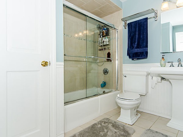 36 Cummings Road, Unit 2 Boston, MA 02135 - Photo 10 of 15 a bathroom with a sink toilet and shower