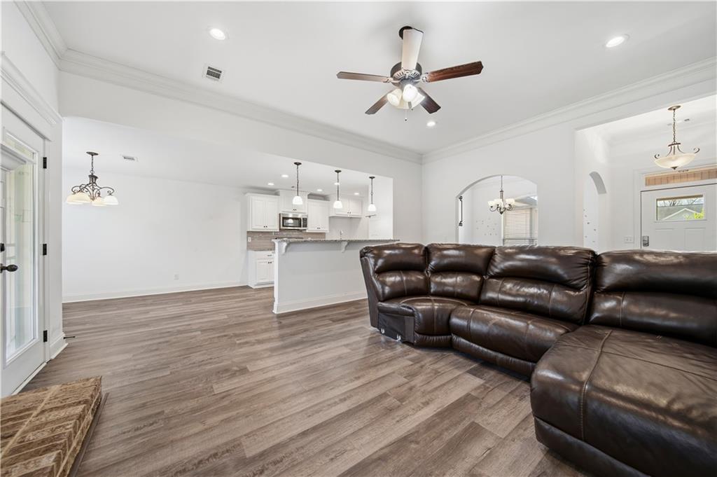 108 Watts Drive Perry, GA 31069 - Photo 12 of 34 a living room with furniture and kitchen view