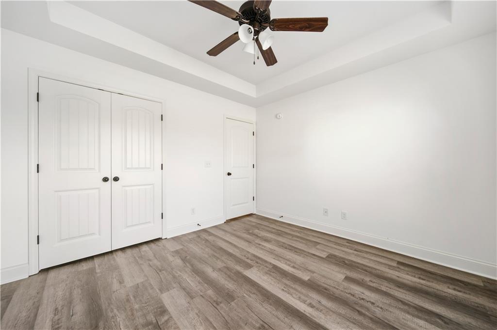 108 Watts Drive Perry, GA 31069 - Photo 24 of 34 wooden floor in a empty room