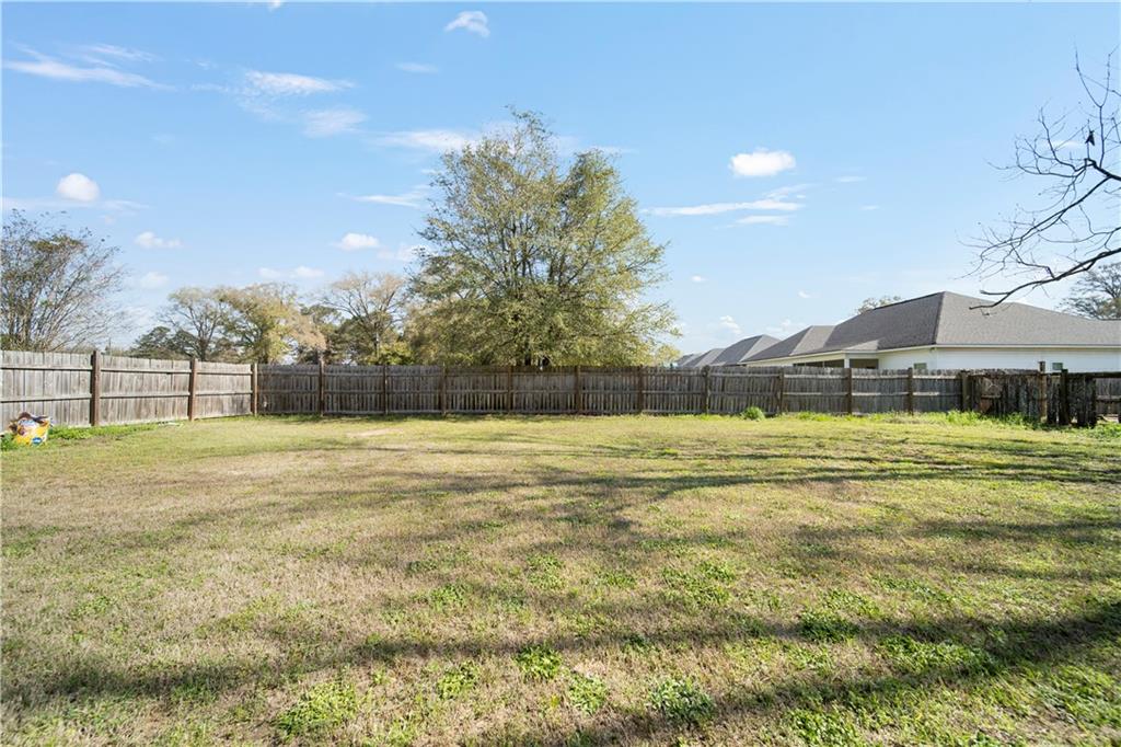 108 Watts Drive Perry, GA 31069 - Photo 33 of 34 a view of a yard with a house