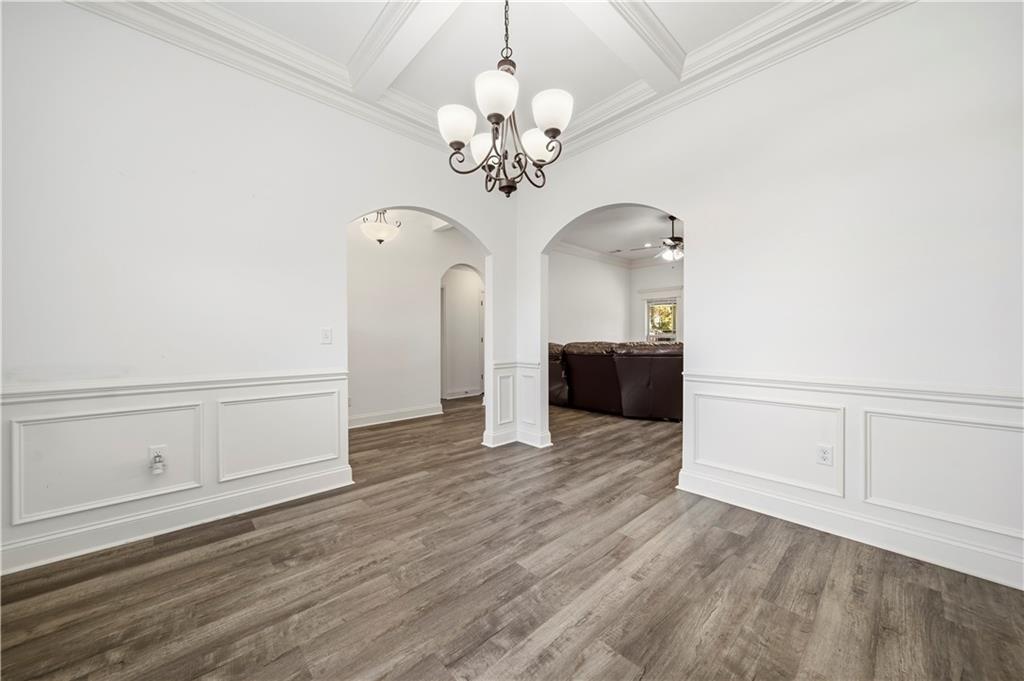 108 Watts Drive Perry, GA 31069 - Photo 9 of 34 a view of a livingroom with wooden floor