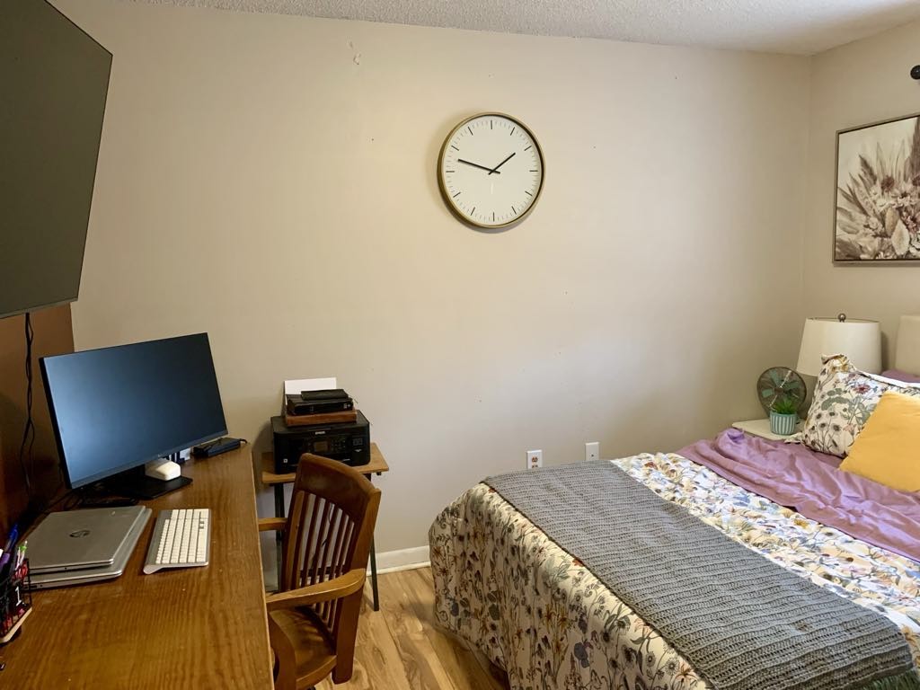 102 McDougal Road Fayetteville, TN 37334 - Photo 12 of 27 a bedroom with a bed and a chair