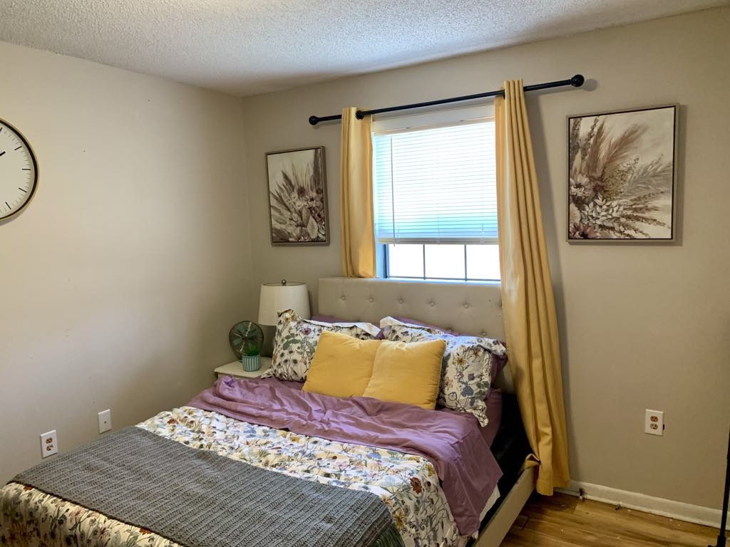 102 McDougal Road Fayetteville, TN 37334 - Photo 13 of 27 a bedroom with a bed and a painting on the wall