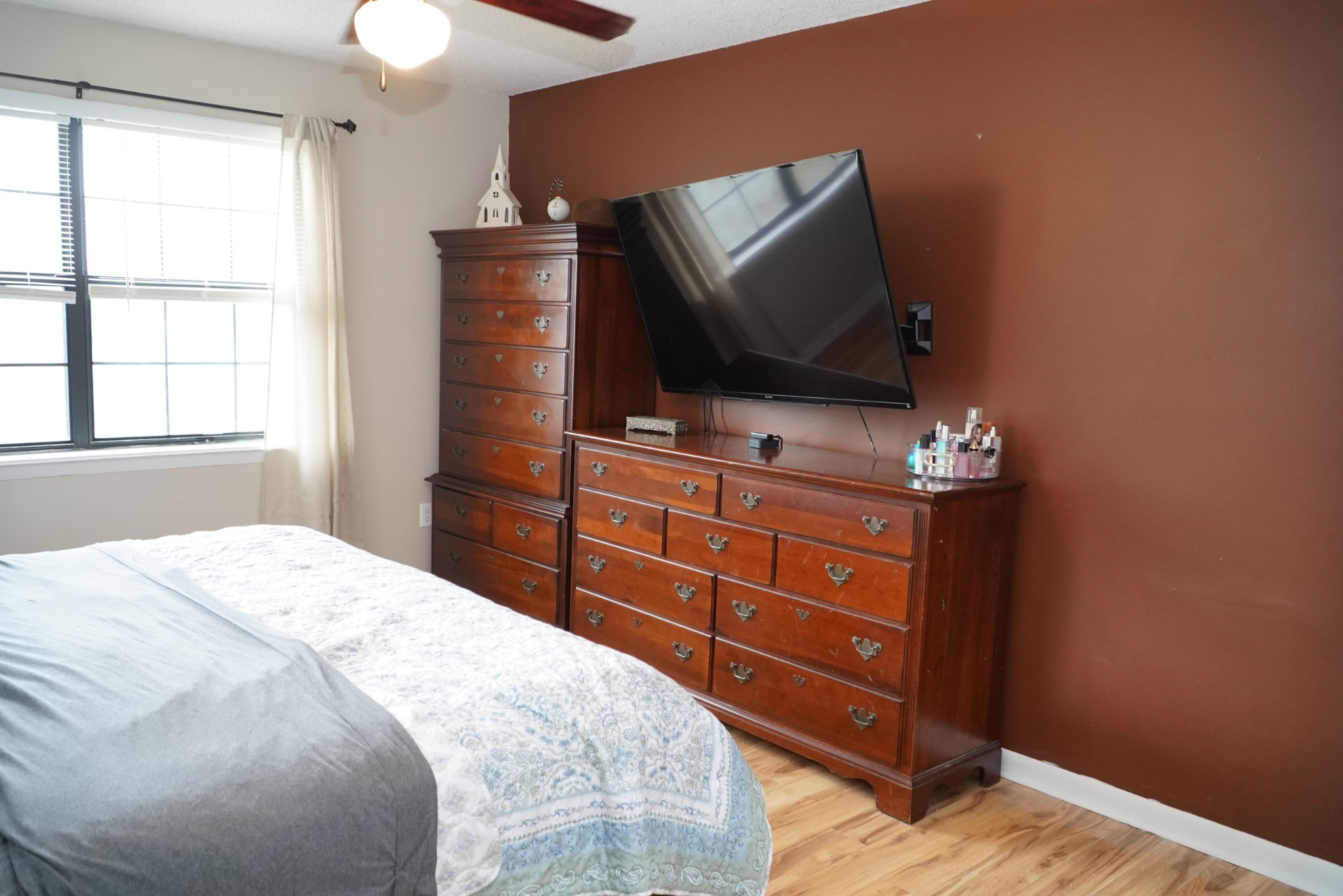 102 McDougal Road Fayetteville, TN 37334 - Photo 17 of 27 a bedroom with a bed and a flat screen tv