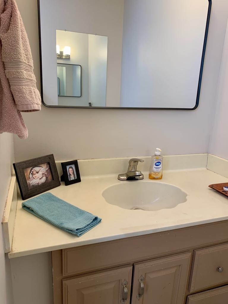 102 McDougal Road Fayetteville, TN 37334 - Photo 20 of 27 a bathroom with a sink and a mirror