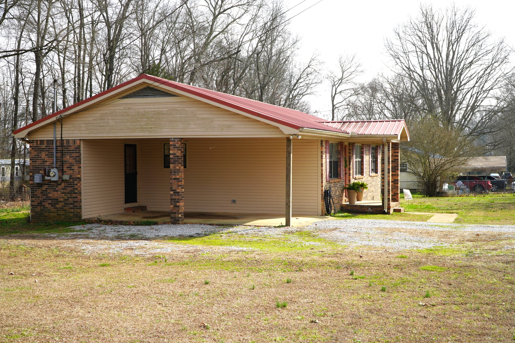102 McDougal Road Fayetteville, TN 37334 - Photo 22 of 27 a house with trees in the background
