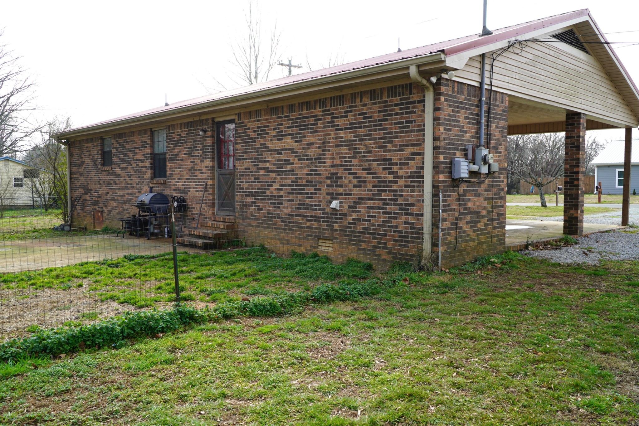 102 McDougal Road Fayetteville, TN 37334 - Photo 25 of 27 a view of a house with a backyard