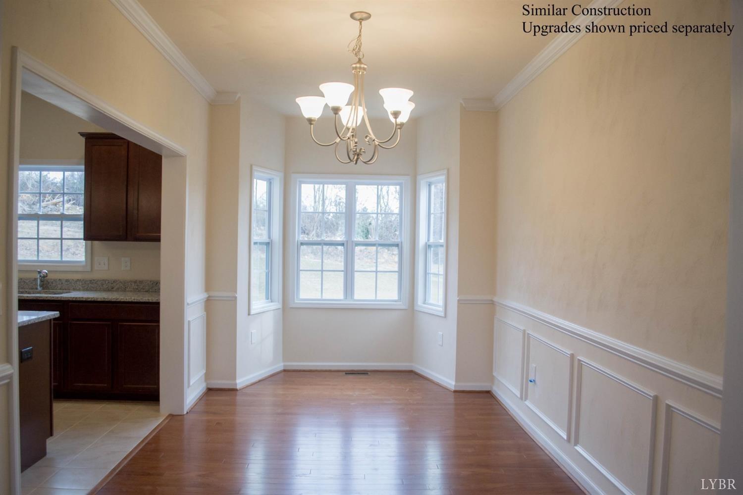 389 Traverse Drive Evington, VA 24550 - Photo 3 of 8 a view of livingroom with chandelier