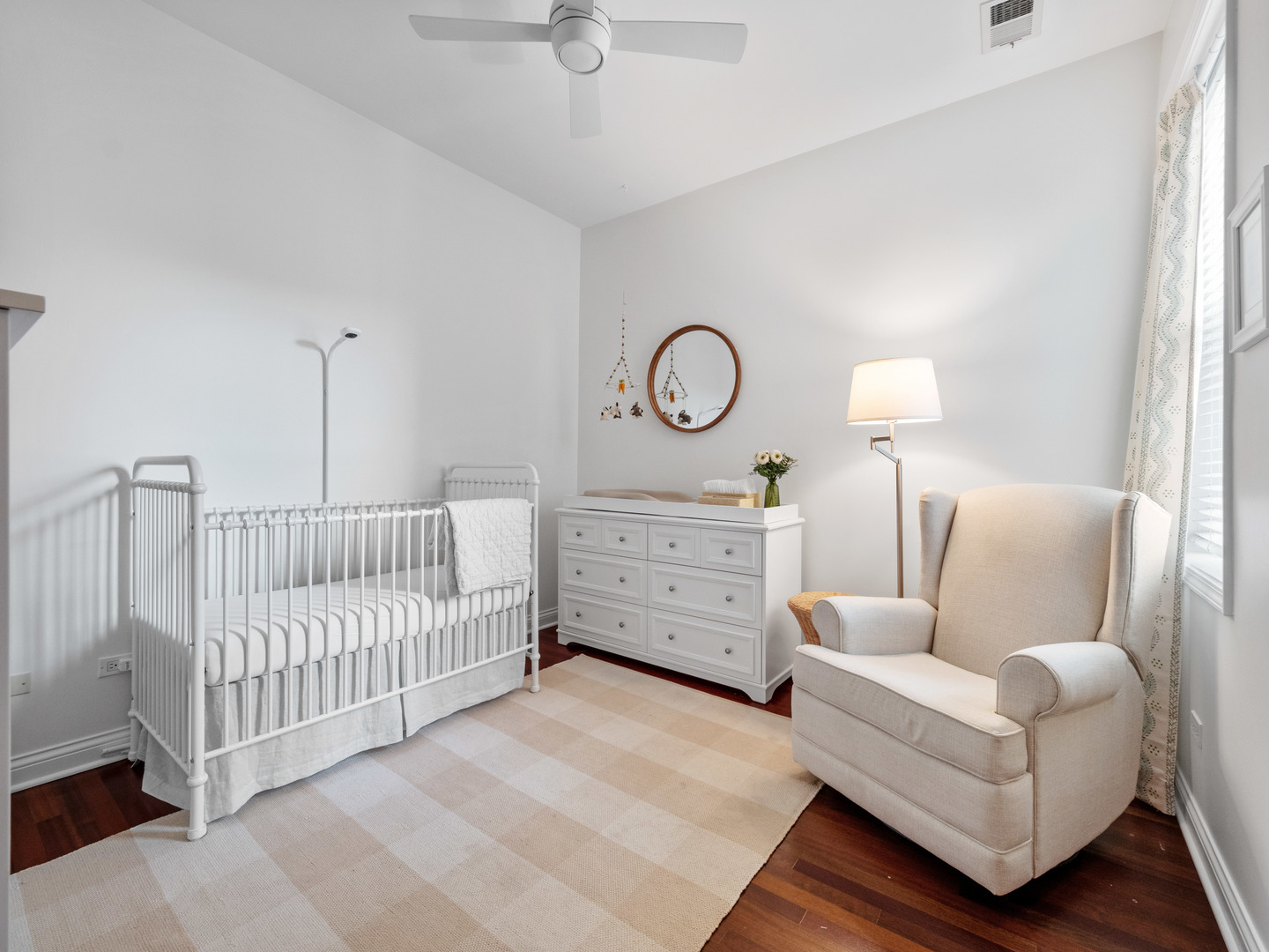 1925 West Irving Park Road, Unit 3 Chicago, IL 60613 - Photo 11 of 26 a bed room with furniture and a window