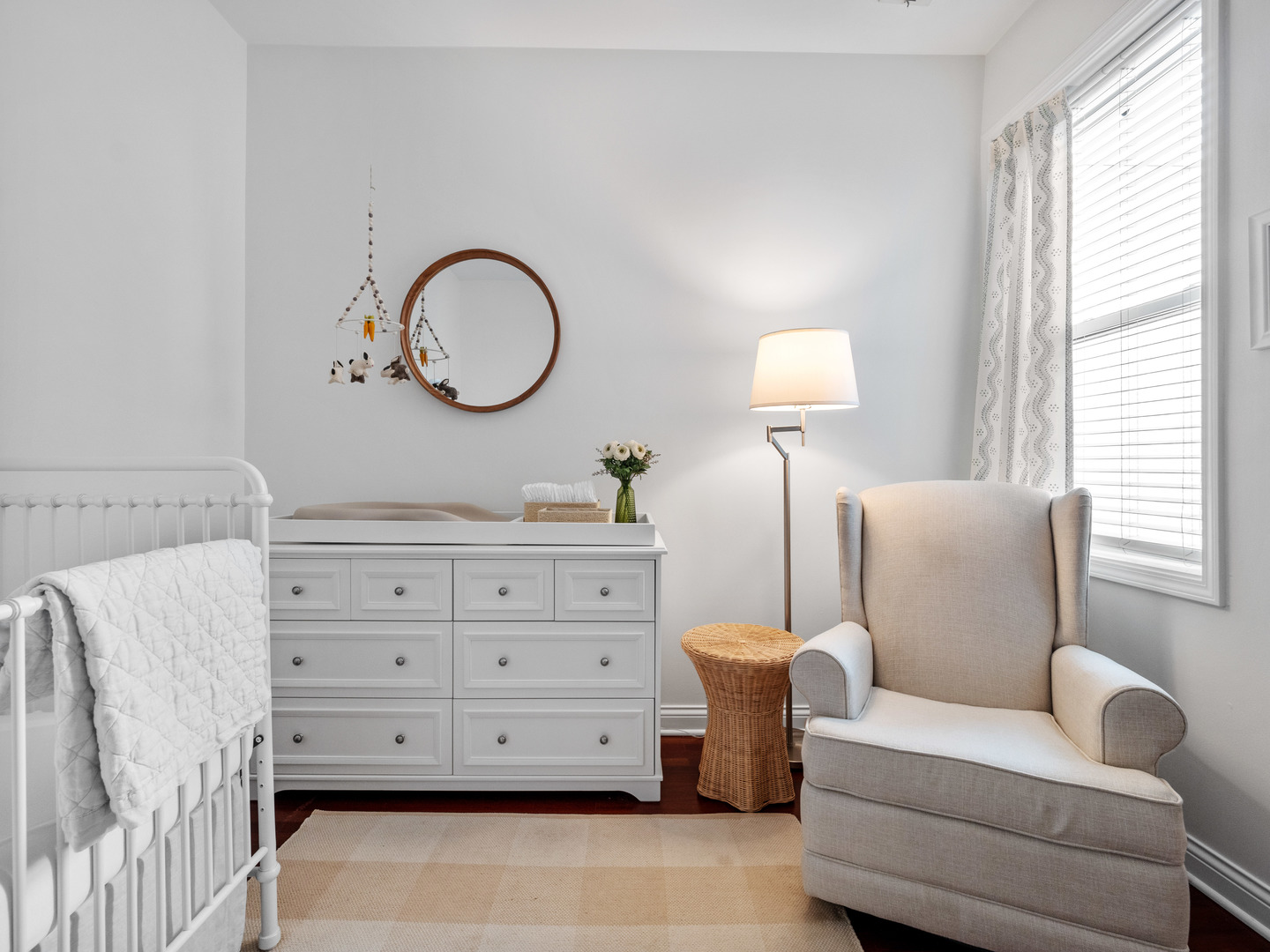 1925 West Irving Park Road, Unit 3 Chicago, IL 60613 - Photo 12 of 26 a living room with furniture a lamp and a window