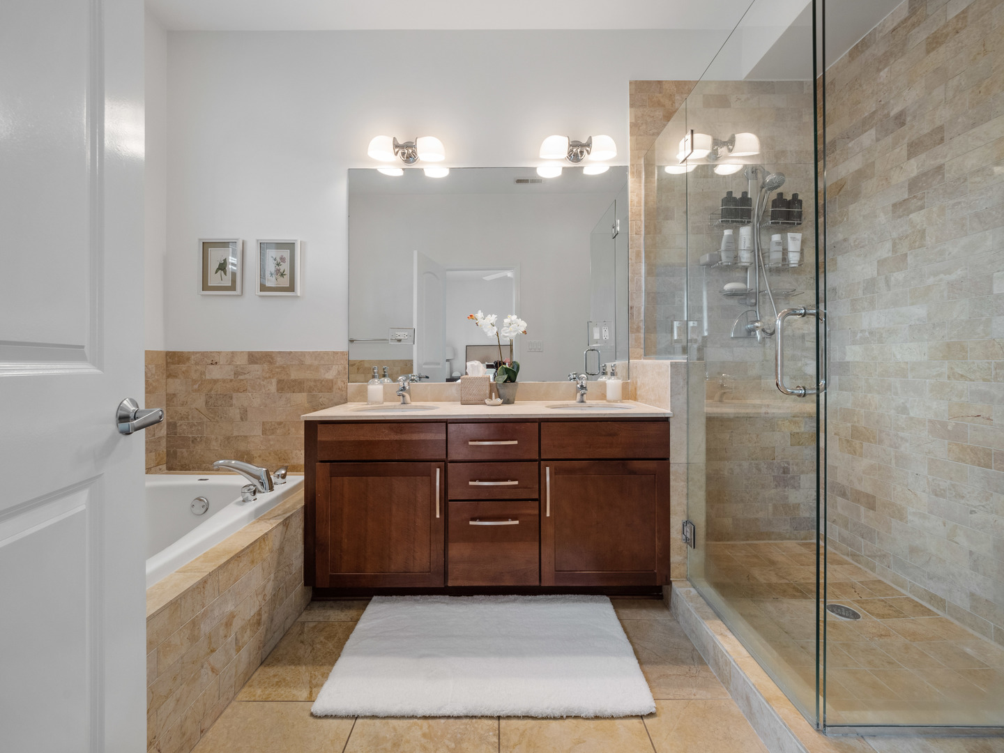 1925 West Irving Park Road, Unit 3 Chicago, IL 60613 - Photo 21 of 26 a bathroom with a tub sink and mirror