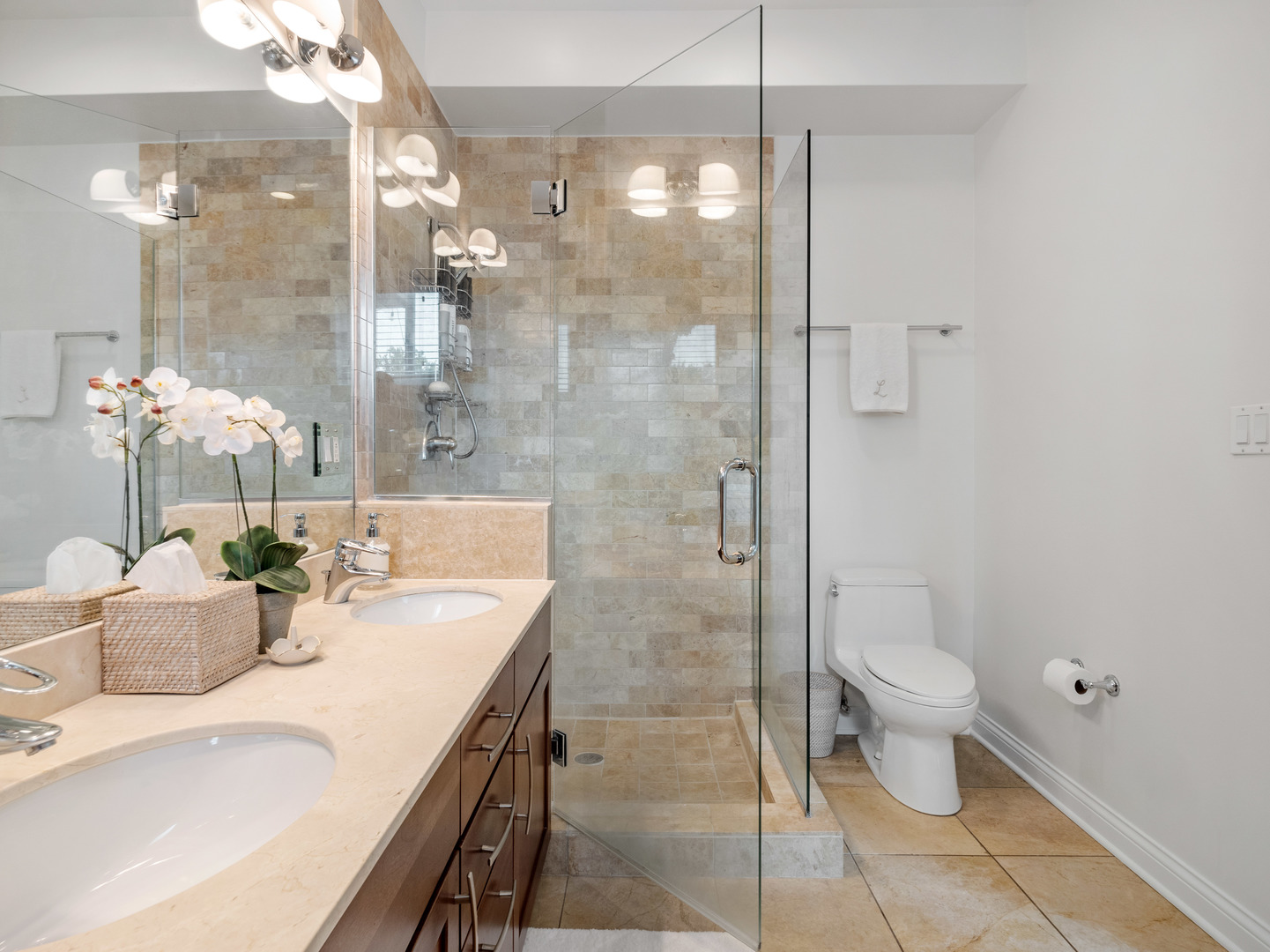 1925 West Irving Park Road, Unit 3 Chicago, IL 60613 - Photo 22 of 26 a bathroom with a sink a toilet and shower
