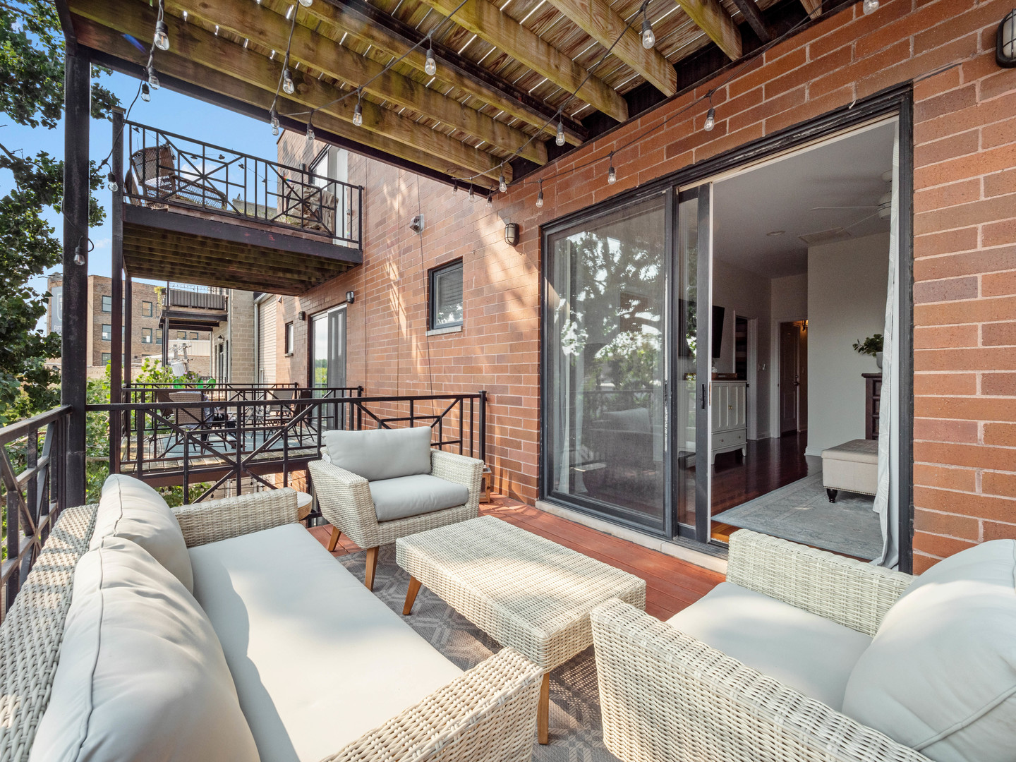 1925 West Irving Park Road, Unit 3 Chicago, IL 60613 - Photo 25 of 26 a outdoor living space with furniture