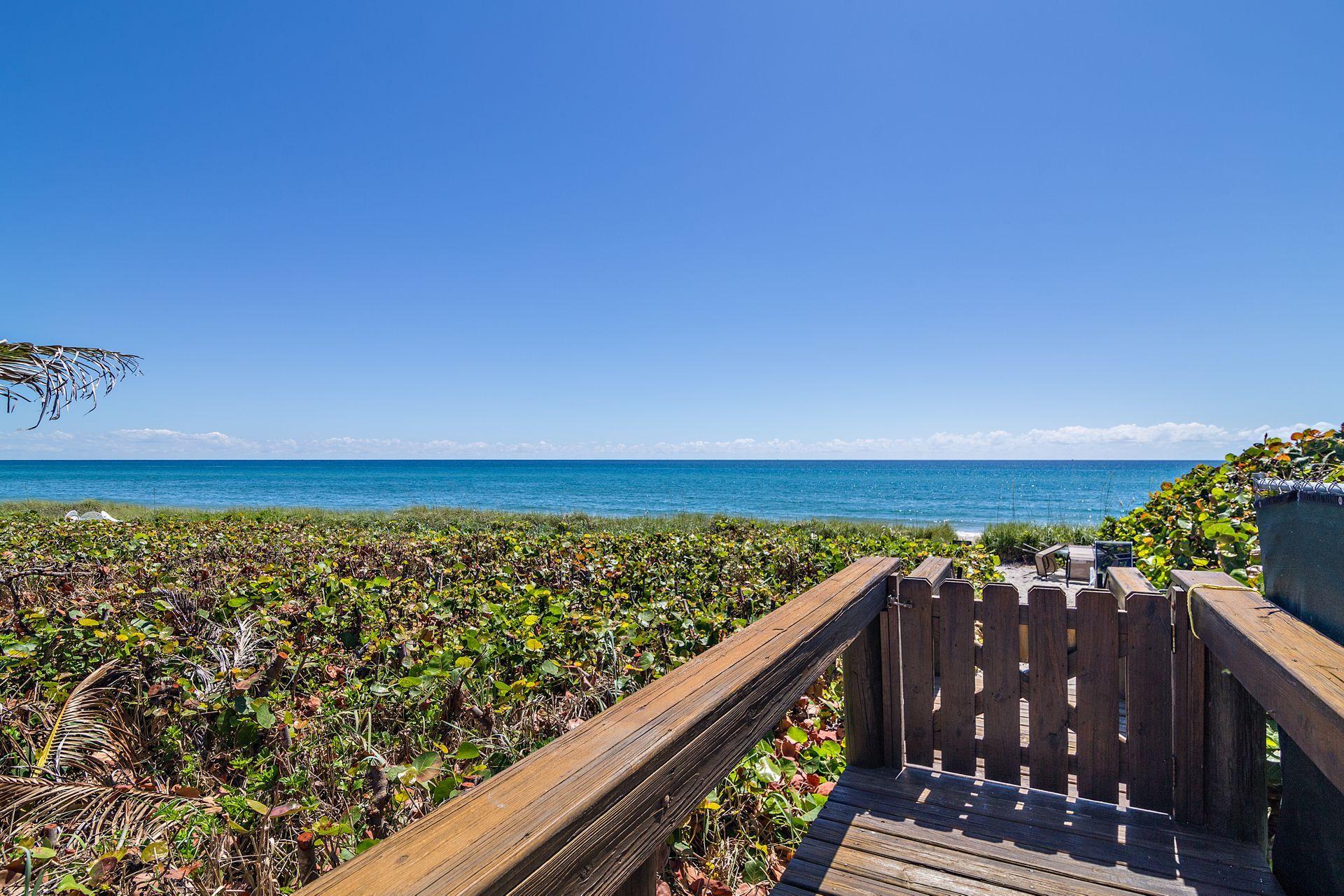 220 Celestial Way, Unit 1 Juno Beach, FL 33408 - Photo 28 of 35 a view of an ocean from a balcony