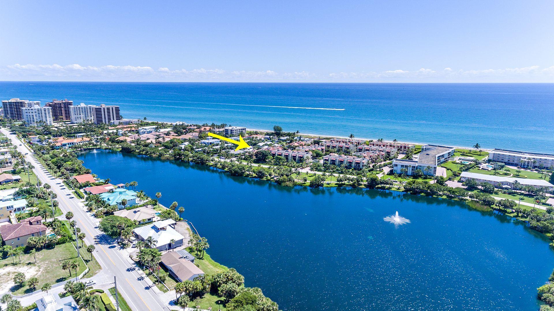 220 Celestial Way, Unit 1 Juno Beach, FL 33408 - Photo 29 of 35 a view of a lake with a room