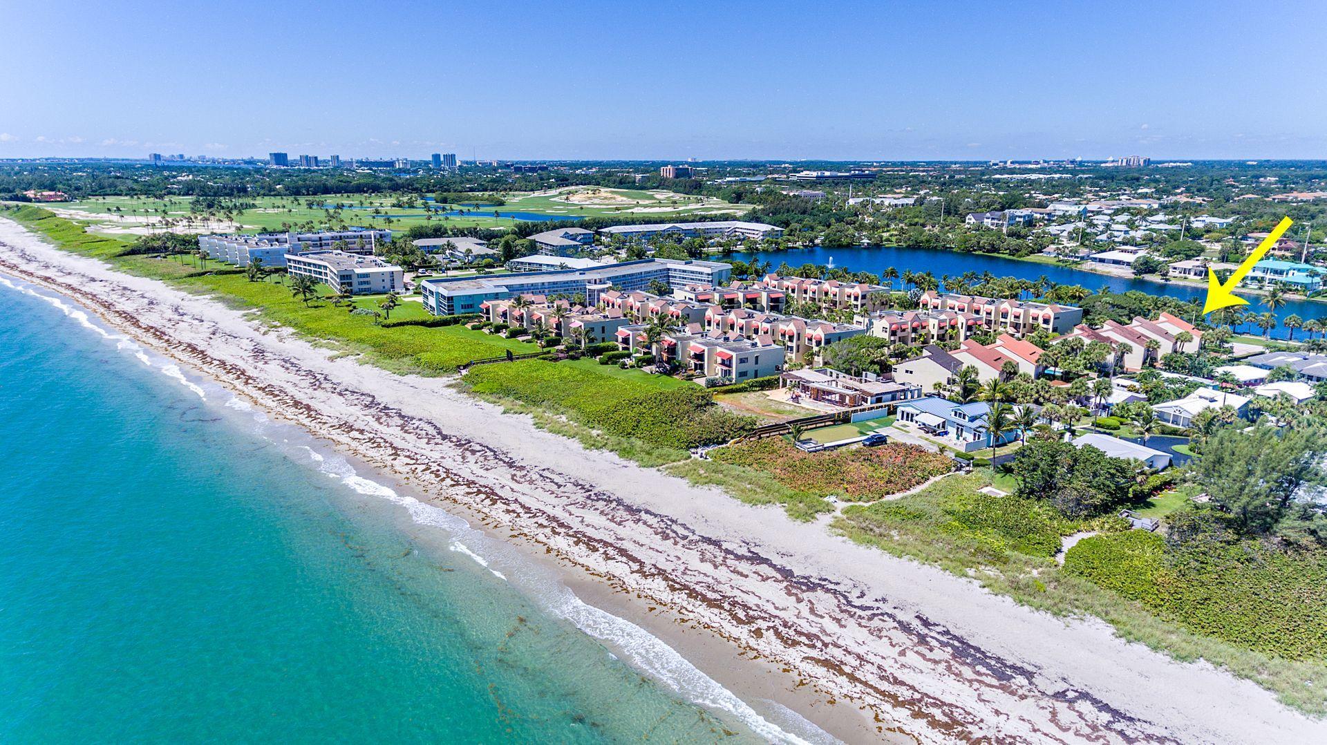 220 Celestial Way, Unit 1 Juno Beach, FL 33408 - Photo 4 of 35 a view of a city with an ocean view