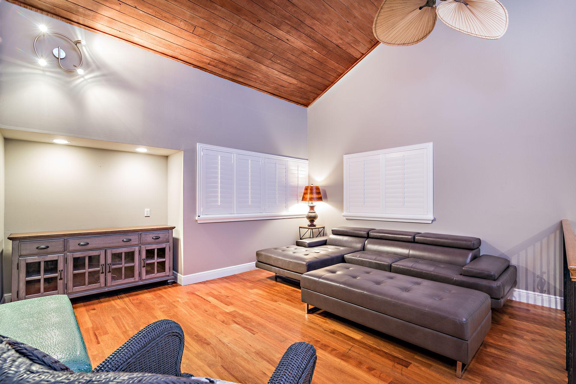 220 Celestial Way, Unit 1 Juno Beach, FL 33408 - Photo 8 of 35 a living room with furniture and a dining table with wooden floor