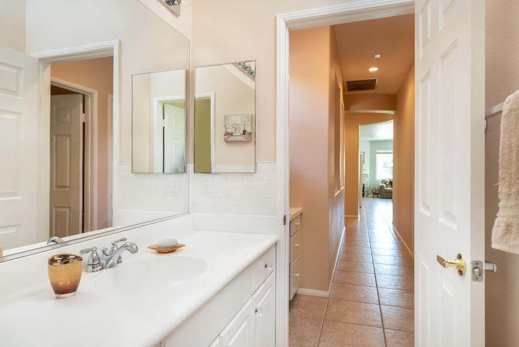 82539 Grant Drive Indio, CA 92201 - Photo 18 of 34 a bathroom with a sink and a mirror