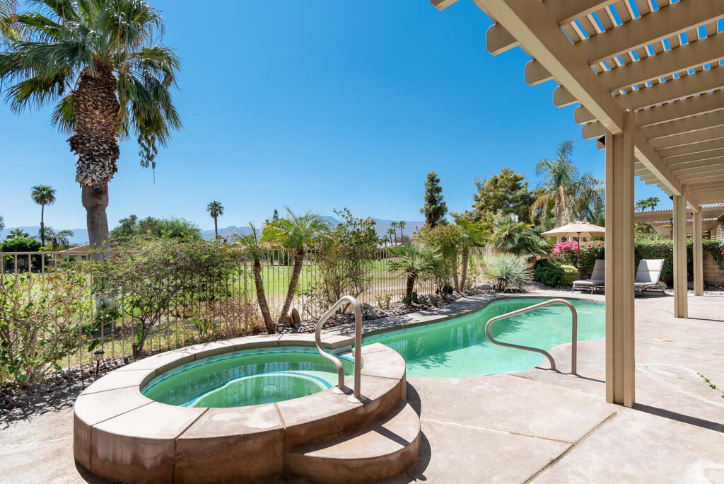 82539 Grant Drive Indio, CA 92201 - Photo 2 of 34 a view of a swimming pool with a patio