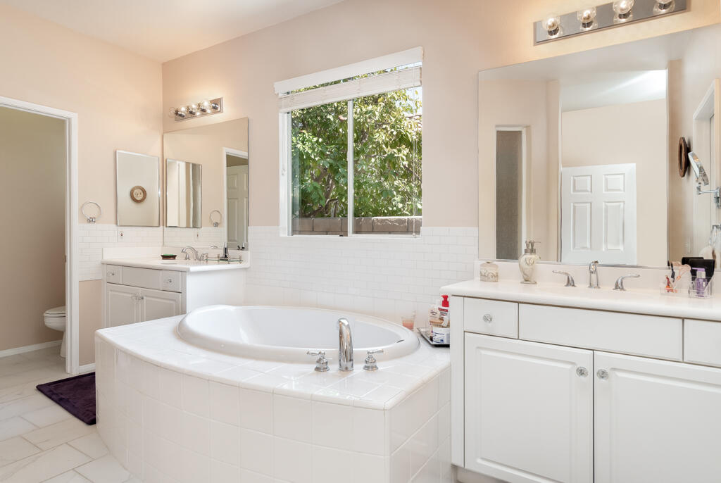 82539 Grant Drive Indio, CA 92201 - Photo 25 of 34 a bathroom with a sink and a mirror