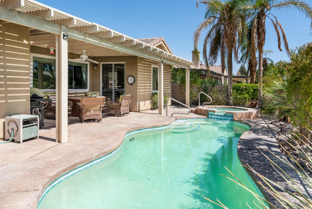 82539 Grant Drive Indio, CA 92201 - Photo 26 of 34 a view of a house with backyard porch and sitting area