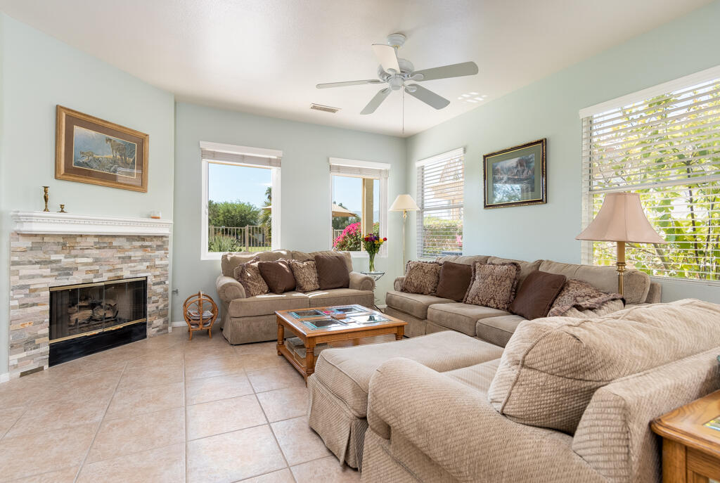 82539 Grant Drive Indio, CA 92201 - Photo 4 of 34 a living room with furniture and a fireplace