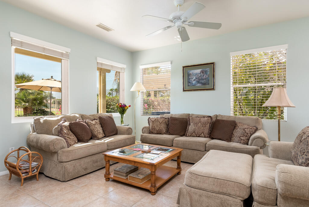 82539 Grant Drive Indio, CA 92201 - Photo 5 of 34 a living room with furniture and a large window
