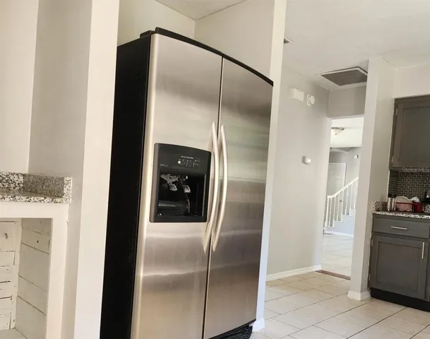 a kitchen with a stove and a microwave