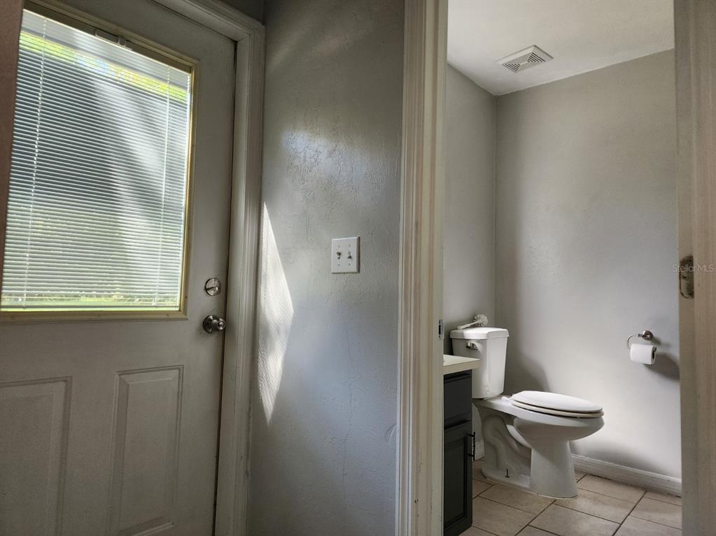 10911 Northwest 31st Place Gainesville, FL 32606 - Photo 15 of 27 a bathroom with a toilet