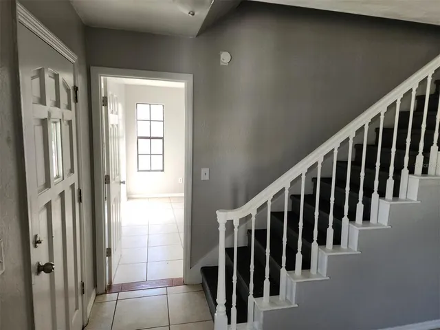 a view of an entryway with staircase