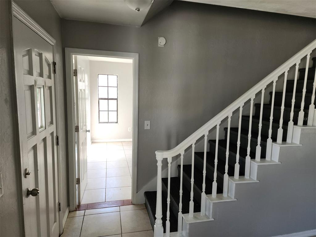 10911 Northwest 31st Place Gainesville, FL 32606 - Photo 2 of 27 a view of an entryway with staircase