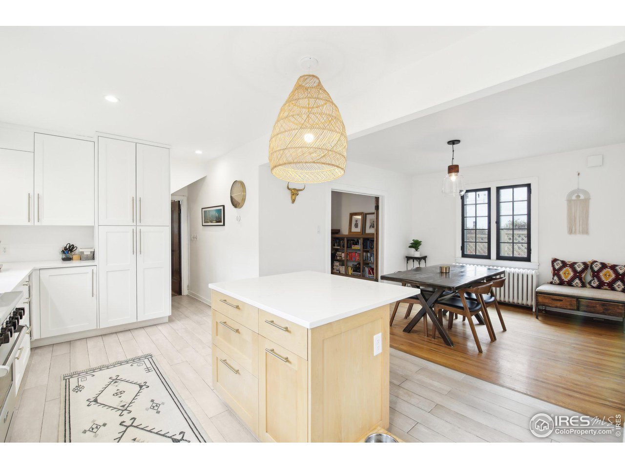 861 13th Street Boulder, CO 80302 - Photo 13 of 36 a living room with furniture and a wooden floor