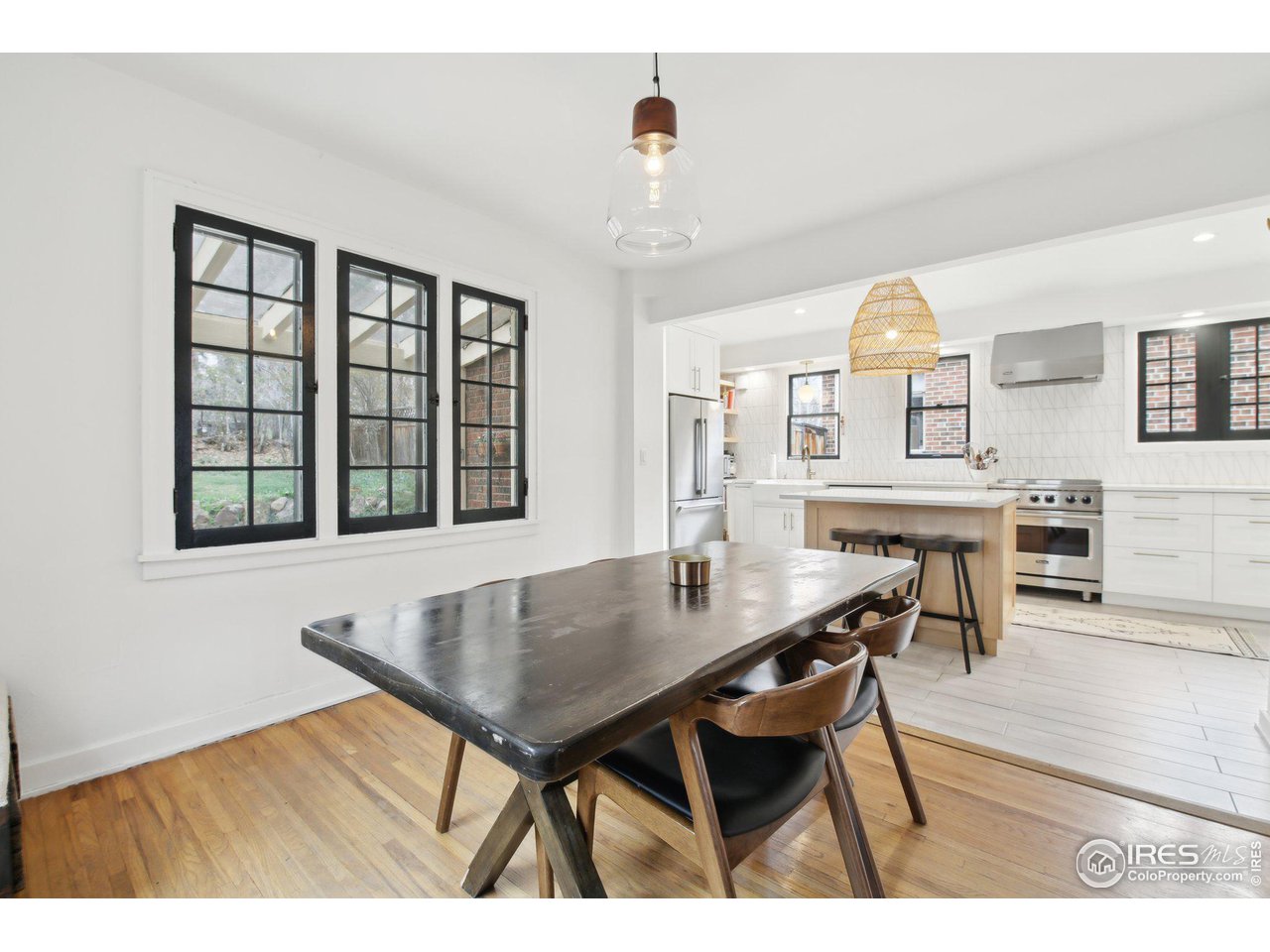 861 13th Street Boulder, CO 80302 - Photo 16 of 36 a view of a dining room with furniture and a window