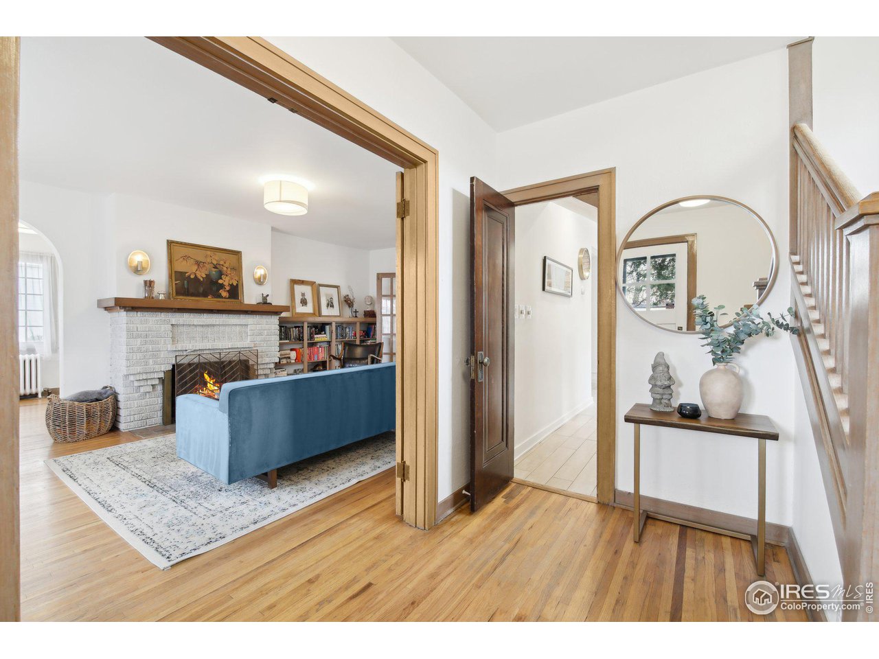 861 13th Street Boulder, CO 80302 - Photo 3 of 36 a living room with furniture and a fireplace