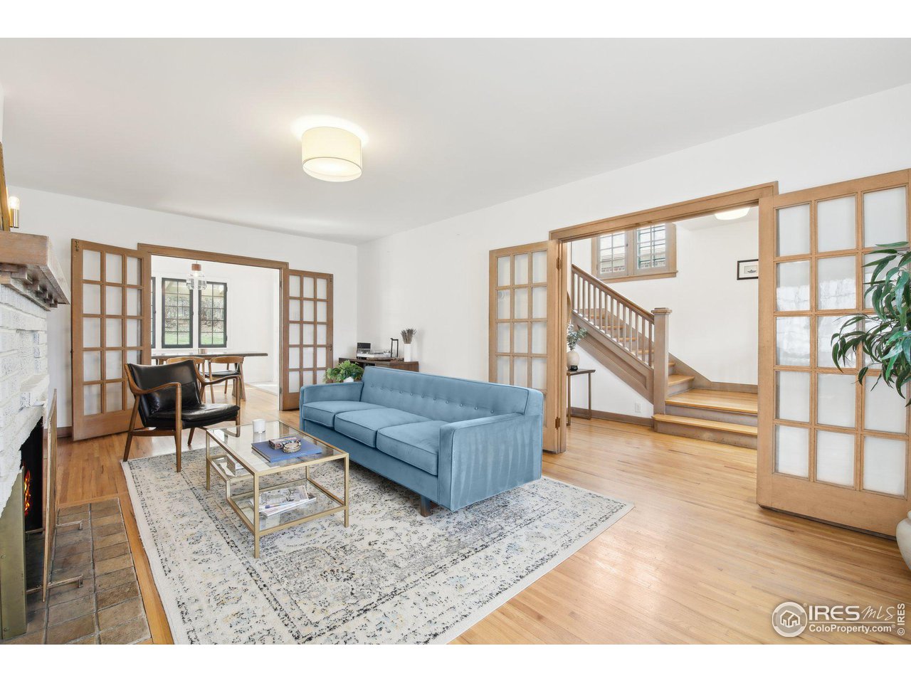 861 13th Street Boulder, CO 80302 - Photo 5 of 36 a living room with furniture and a table