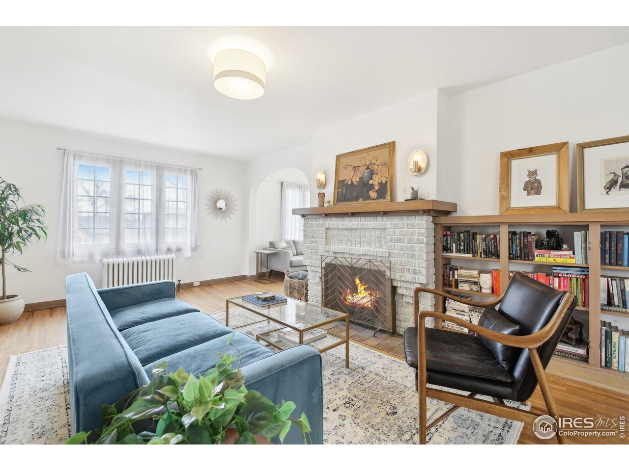 861 13th Street Boulder, CO 80302 - Photo 6 of 36 a living room with furniture and a fireplace