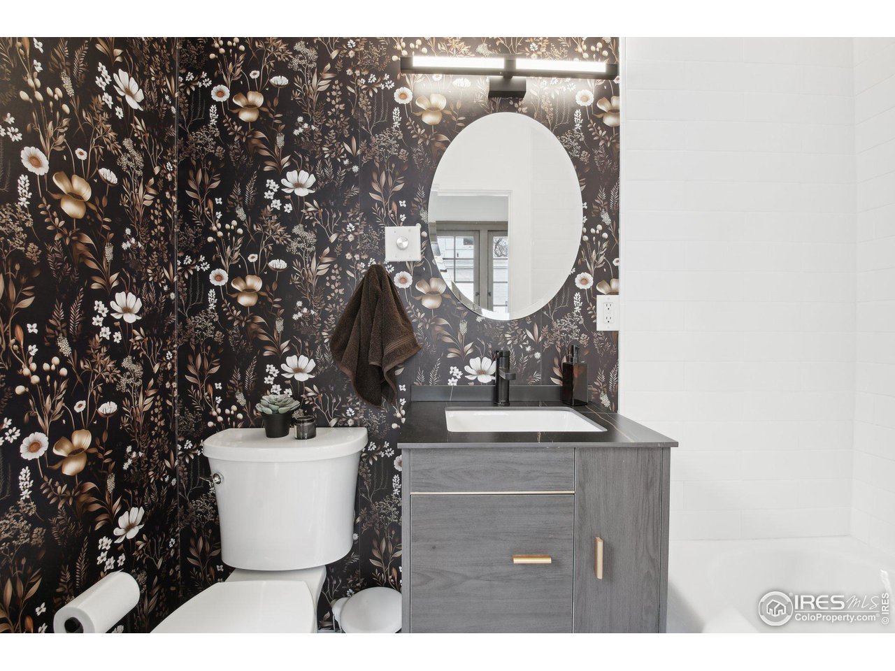 861 13th Street Boulder, CO 80302 - Photo 10 of 36 a view of a bathroom with a sink and a toilet