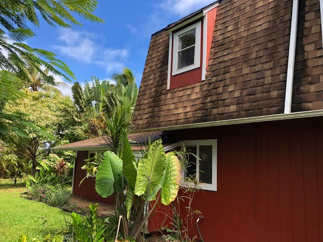 121 Oili Road Haiku, HI 96708 - Photo 6 of 24 a backyard of a house with lots of green space