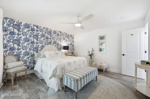 a bedroom with a bed and a cabinets