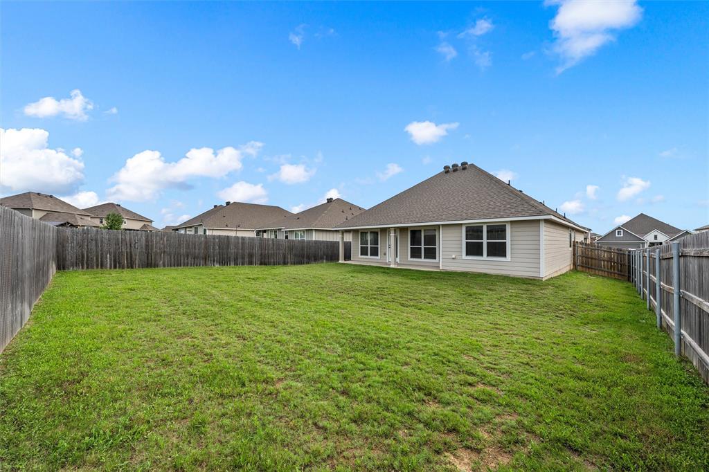 3213 Dottavio Road Lorena, TX 76655 - Photo 28 of 32 a front view of a house with garden