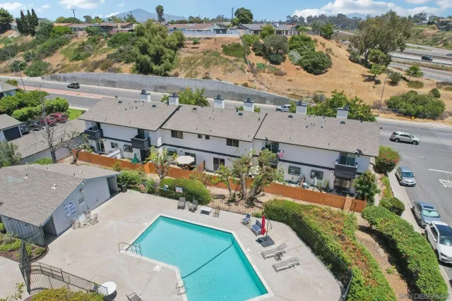 a view of a house with a street