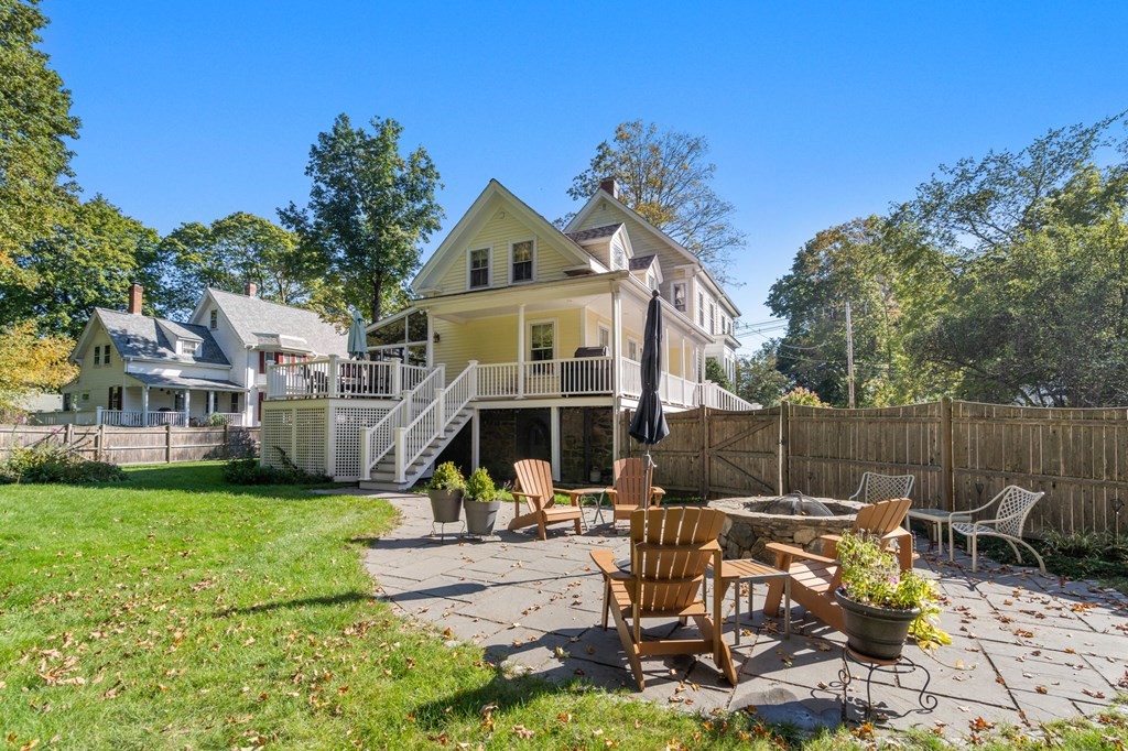 319 Sherman Street Canton, MA 02021 - Photo 25 of 29 a view of a house with backyard porch and sitting area