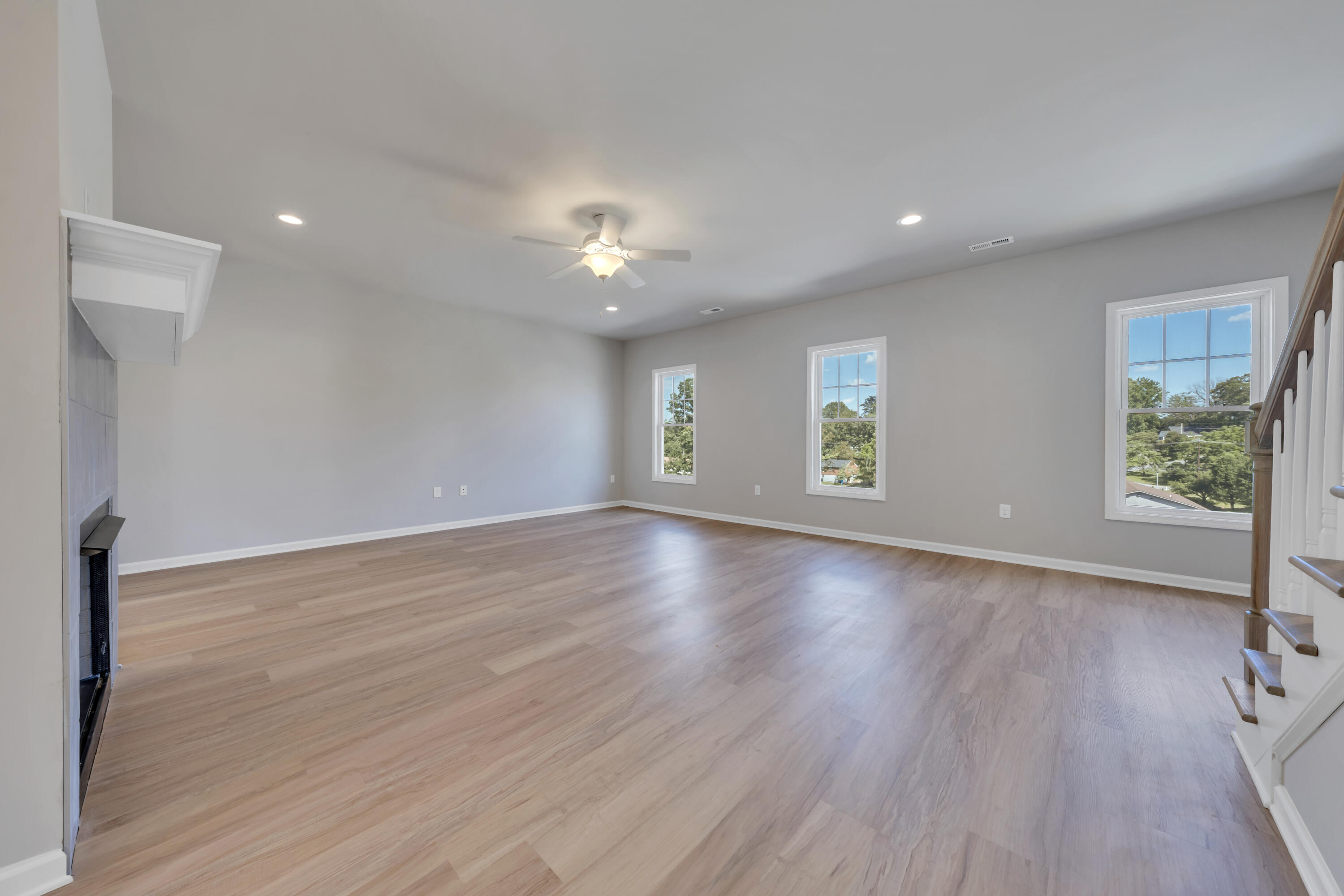 3740 Crescent Ridge Drive Southwest Roanoke, VA 24015 - Photo 4 of 25 an empty room with wooden floor and windows