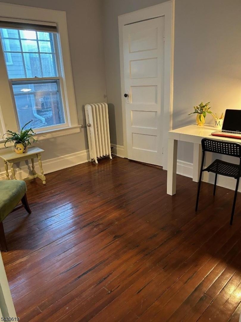 96 Grove Street Montclair, NJ 07042 - Photo 19 of 23 a view of a workspace with furniture and a window