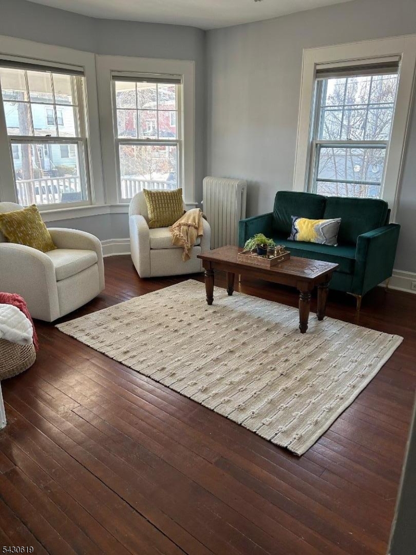 96 Grove Street Montclair, NJ 07042 - Photo 3 of 23 a living room with furniture and a window