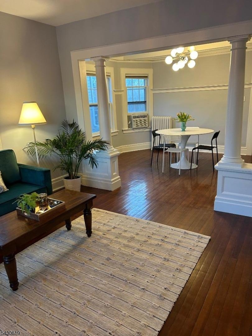 96 Grove Street Montclair, NJ 07042 - Photo 7 of 23 a living room with furniture and a table