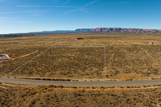 11 Crimson Road East, Unit 11 Kanab, UT 84741 - Photo 9 of 21 Overview of rural landscape with a mountain backdrop and a desert landscape